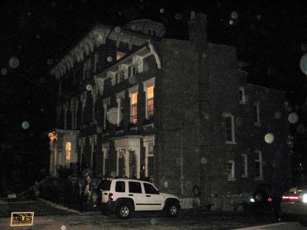 bad pictuer but could be a lady in long dress slave housesmallerresized.jpg